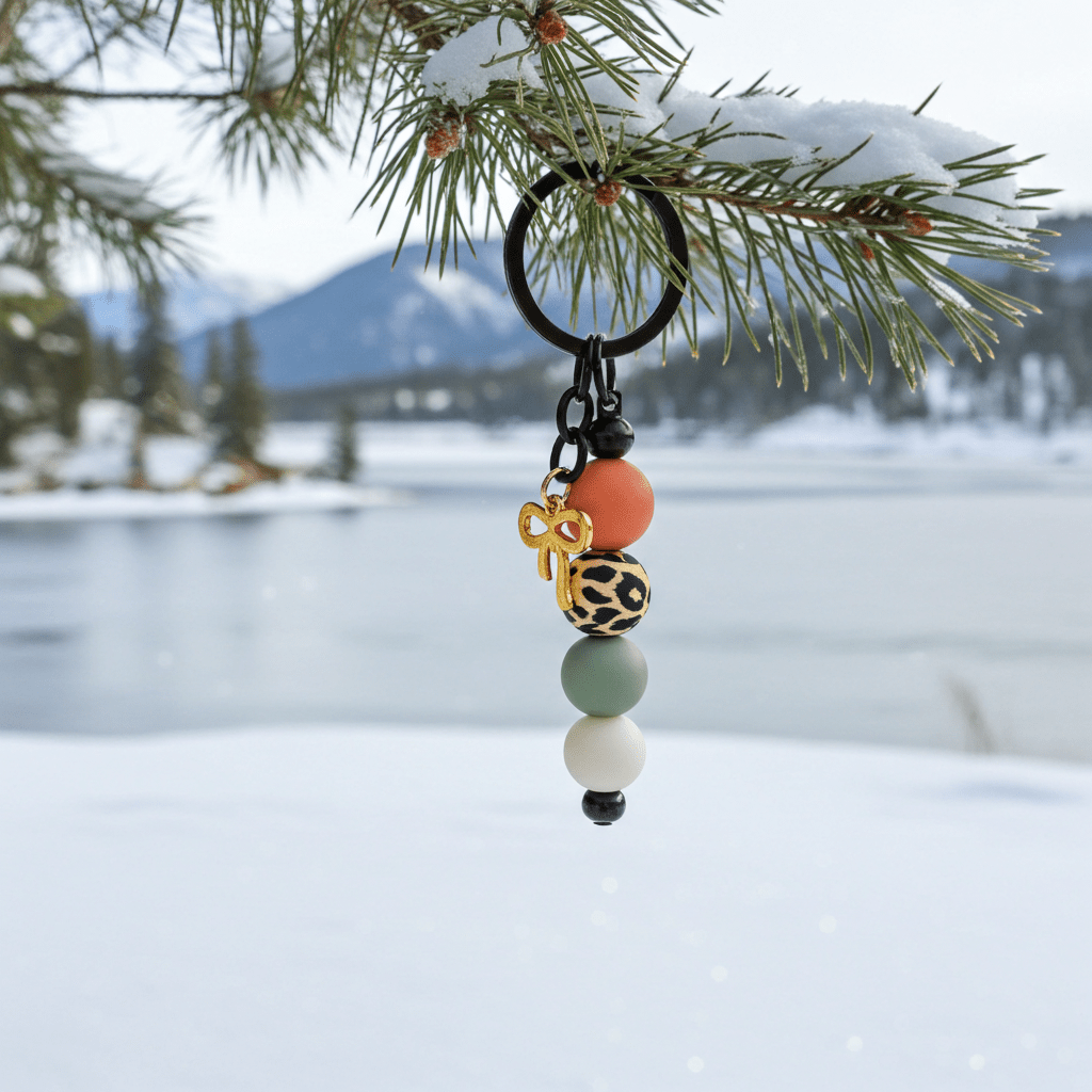 Introducing our stunning handmade gold bow charm keychain with colorful beads, a delightful accessory created with love and precision in polymer clay.